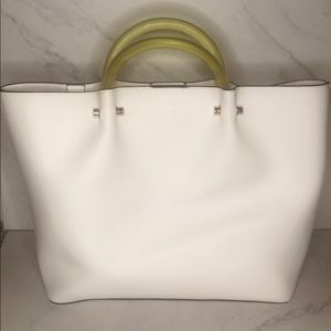 White bag with yellow handles very cute never worn